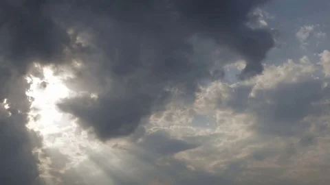 The rays of the sun through the cloudy sky Stock Footage 79014228