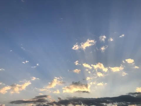The rays of the sun view in the sky with clouds Stock Photos