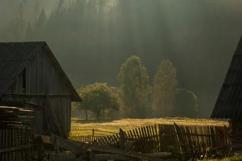 The rays of the sun in the village Stock Photos