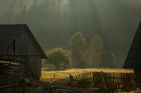 The rays of the sun in the village Stock Photos