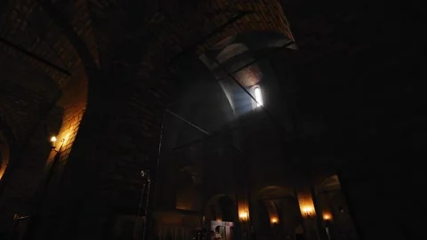 Rays of sunlight enter through the windows of the temple Stock Footage 311443976