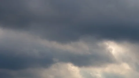 The rays of sunlight pass through the gaps in the clouds, form "light columns"  Stock Footage 119306377