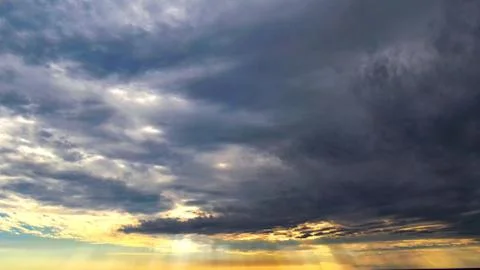 Rays of Sunlight Shining Over Ocean Stock Photos