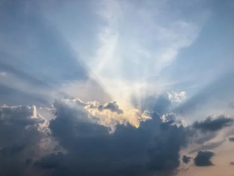 Rays of sunlight through dark clouds Fotos Stock