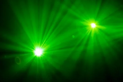 Rays theatrical spotlights on the stage during the performance Stock Photos