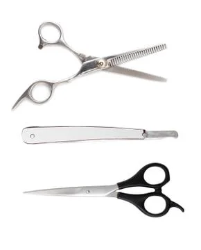 Razor and scissors on a white background Stock Photos