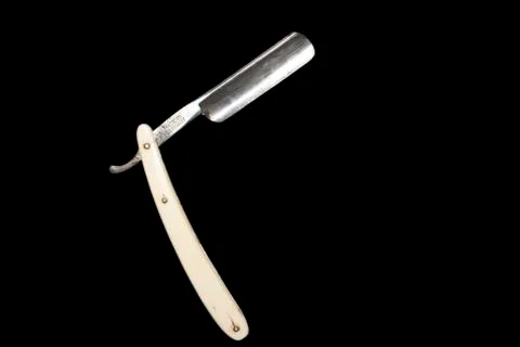 Razor on Black Stock Photos
