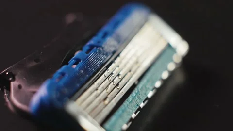 The razor blade rotates in close-up Stock Footage 167213618