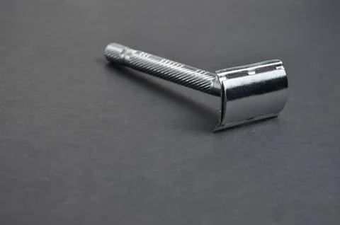 Razor on a gray background. Stock Photos