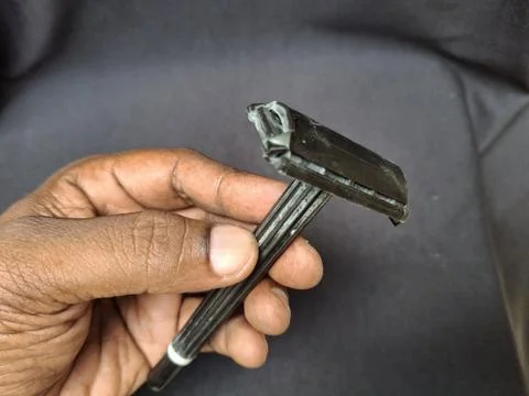 Razor : This precision razor features a sharp blade and ergonomic handle 写真素材