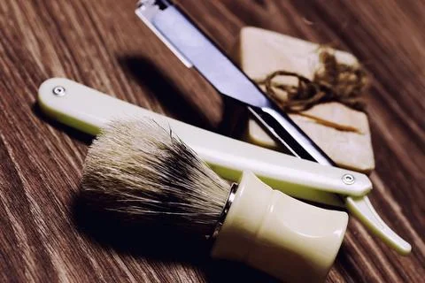 Razor sharp soap brush retro Men s cosmetics shaving brush and razor on a ... Stock Photos