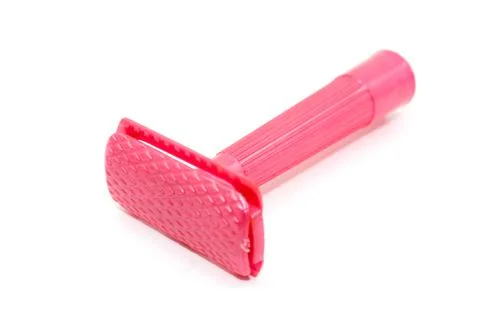 Razor on white background with selective focus Stock Photos