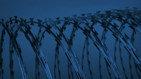 Razor Wire In The Dark Stockbeeldmateriaal 230652387