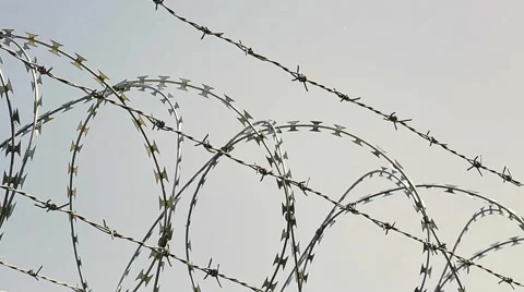 Razor Wire Fence Stock Footage 64847221