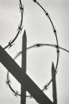 Razor Wire Shadows 스톡 사진