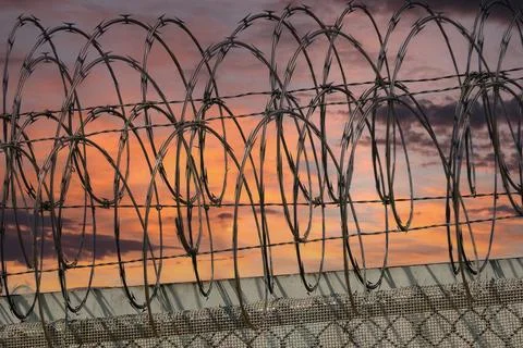 Razor Wire Sunset Stock Photos