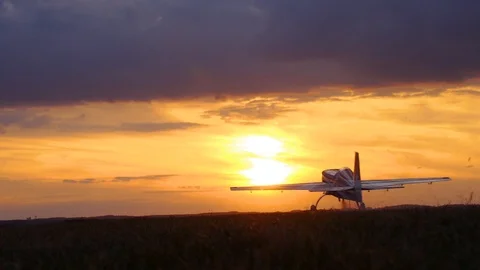 RC aircraft at sunset Stock Footage 102021963