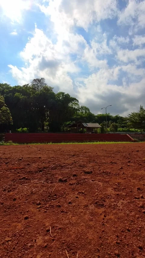 RC car traversing a large soccer field Stock Footage 330477442