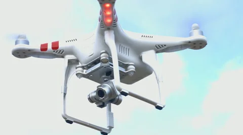 RC copter hovering in the sky removes video.  Stock Footage 59988009