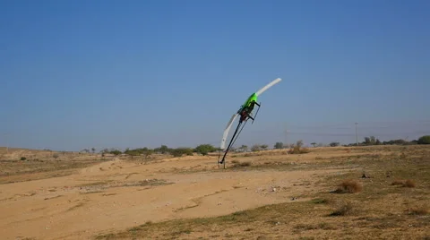 Rc Helicopter Acrobatic maneuver  - slow motion Stock Footage 45552402