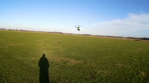 RC Helicopter hovering and then forward flight Stock Footage 52739190
