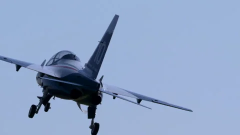 RC Jet Leonardo M-346 Master Takeoff From Grass Airfield Low Angle Stock Footage 334293257