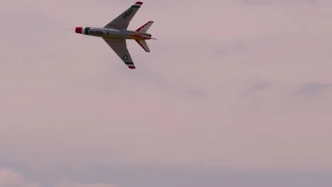 RC jet model airplane flying high in the sky Stock Footage 225531966
