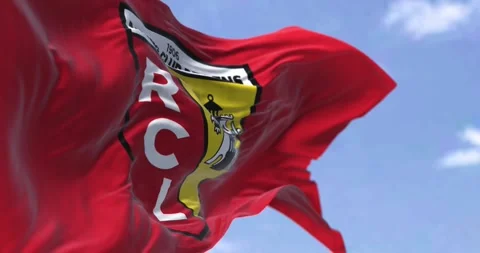 RC Lens flag waving in the wind on a clear day Stock-Footage 249838053