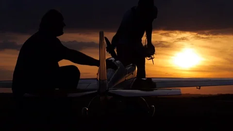 RC model aircraft at sunset Stock Footage 102020793