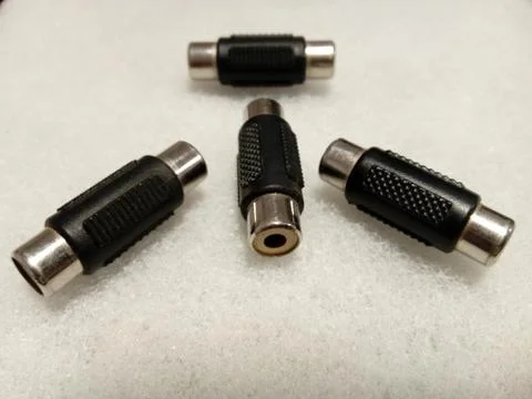 Rca adapters to extend audio cables Stock Photos