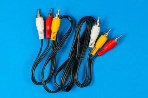 RCA cables isolated on blue background Stock Photos