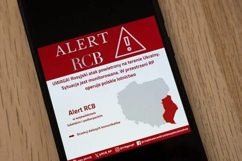 RCB air attack alert for eastern Poland on phone screen Stock Photos