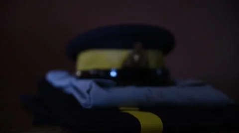 RCMP Hat &amp; Folded Uniform (Slide in) Video stock 50222798