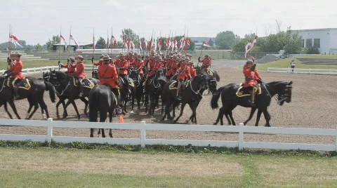 RCMP Mounties Perform The Musical Ride On Horseback  Stock Footage