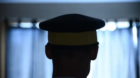 RCMP putting Hat on Silhouette Video stock 50224691