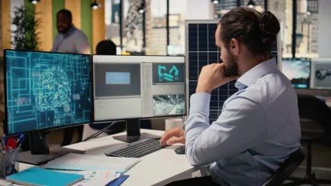 RD department researcher using machine learning tech to study solar green energy Stock Footage 316005238