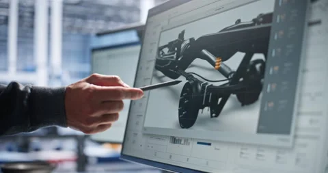 RD Engineer Validating Robotic Machinery Design and Control Parameters on Stock Footage 344395949
