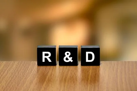 R&amp;d or Research and development on black block Foto stock