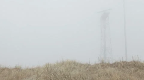 Rdar tower in operation in mist Stock Footage 37219328