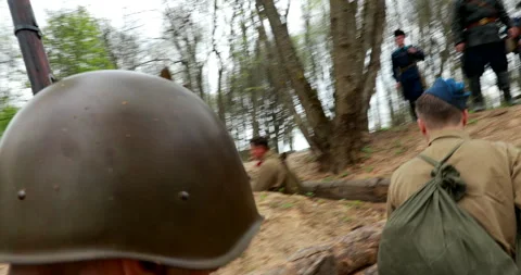 Re-enactors Dressed As Soviet Russian Soldiers Take Up Fighting Positions In Stock Footage 260604137