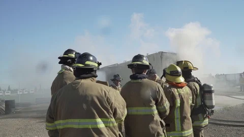 Re Grouping of fire fighters Stock Footage 130081131