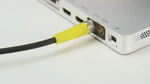 Re-plugging Yellow Cable to a Slot Stock Footage 70996767