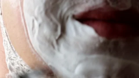Re-shaving the face for a smoother effect. Stock Footage 172124746
