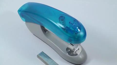 Re Springing Staples In A Staple Point Of View Isolated On White Office,Business Stock Footage 37553836