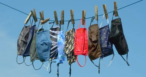 Re-usable face masks drip drying. 스톡 동영상 139301639