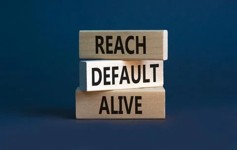 Reach default alive symbol. Concept words Reach default alive on wooden block Stock Photos