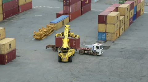 Reach stacker lifting container off lorry or truck, noumea, new caledonia Video stock 35810558