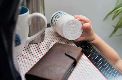 Reaching for the bottle Stock Photos