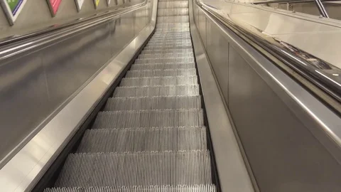 Reaching the edge of the escalator in the subway. Stock Footage 77514357