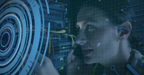 Reaching female technician adjusting patch cables in rack in lab, HUD overlay, Stock Photos